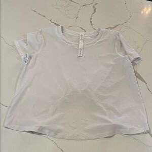 lululemon athletica White Short Sleeve tee with cutout back size 2
